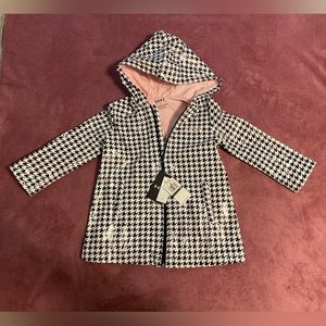 DKNY Little girls raincoat. Black and White Houndstooth pattern.